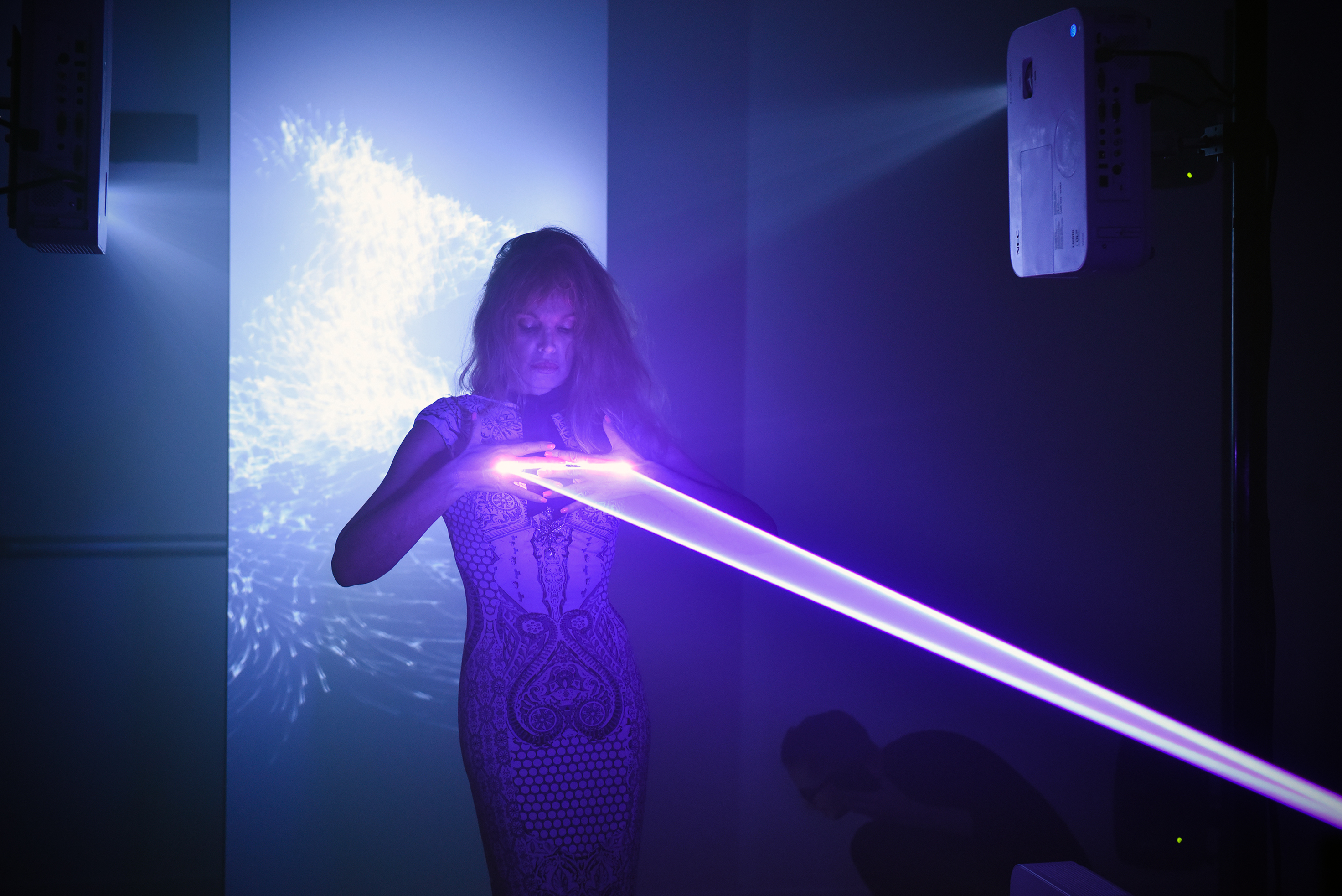 The actress Arielle Dombasie in the audiovisual installation of laser TremensS